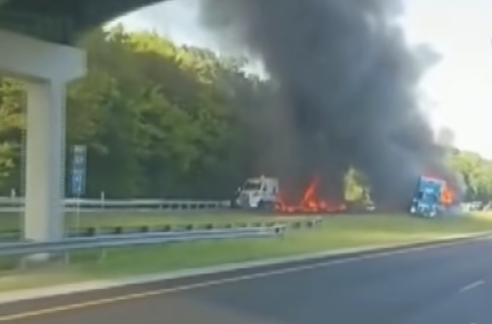 Fatal tractor-trailer collision ignites four vehicles, killing one driver