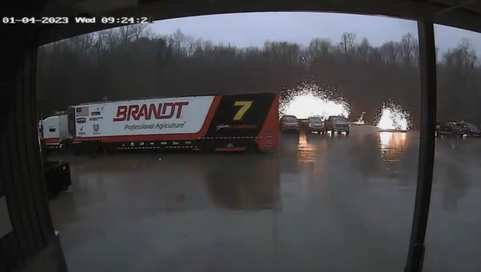Lightning strike narrowly misses NASCAR hauler in dramatic video footage