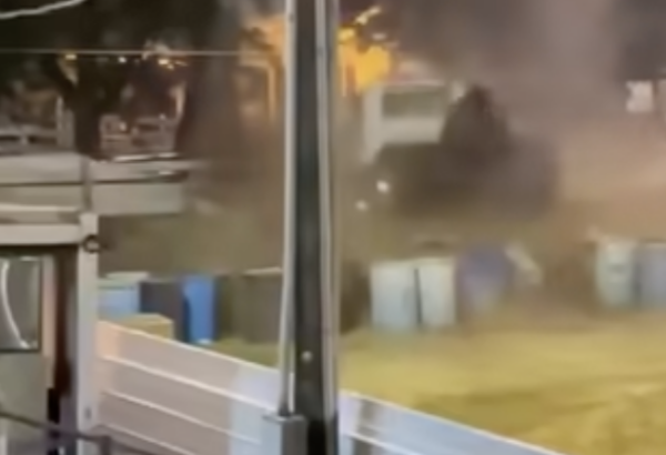 Semi truck crashes through barrier during spectator-filmed truck pull event